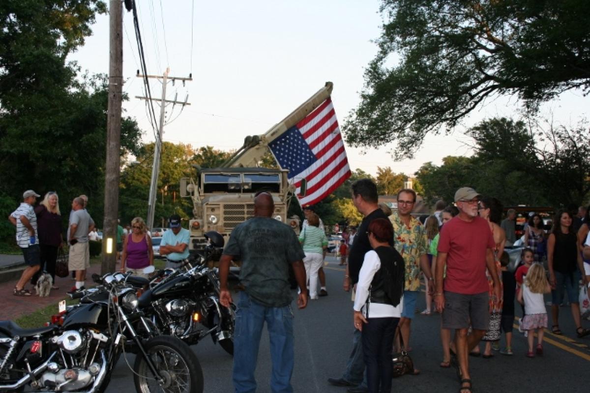 A military vehicle with a flag 2