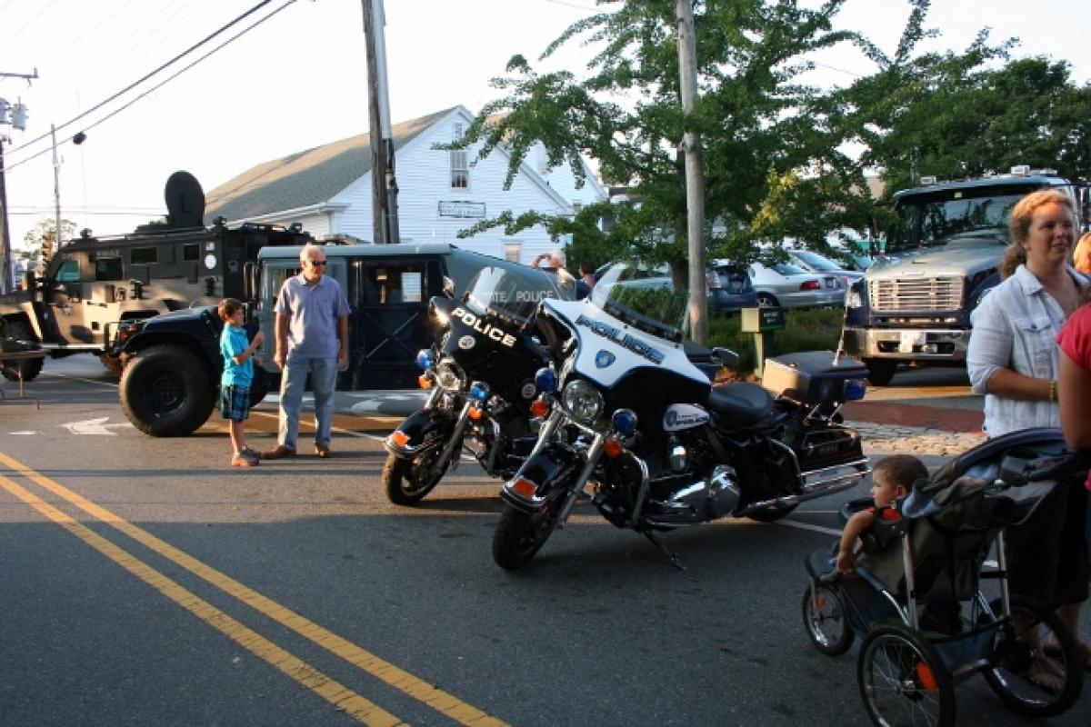 People viewing police motorcycles