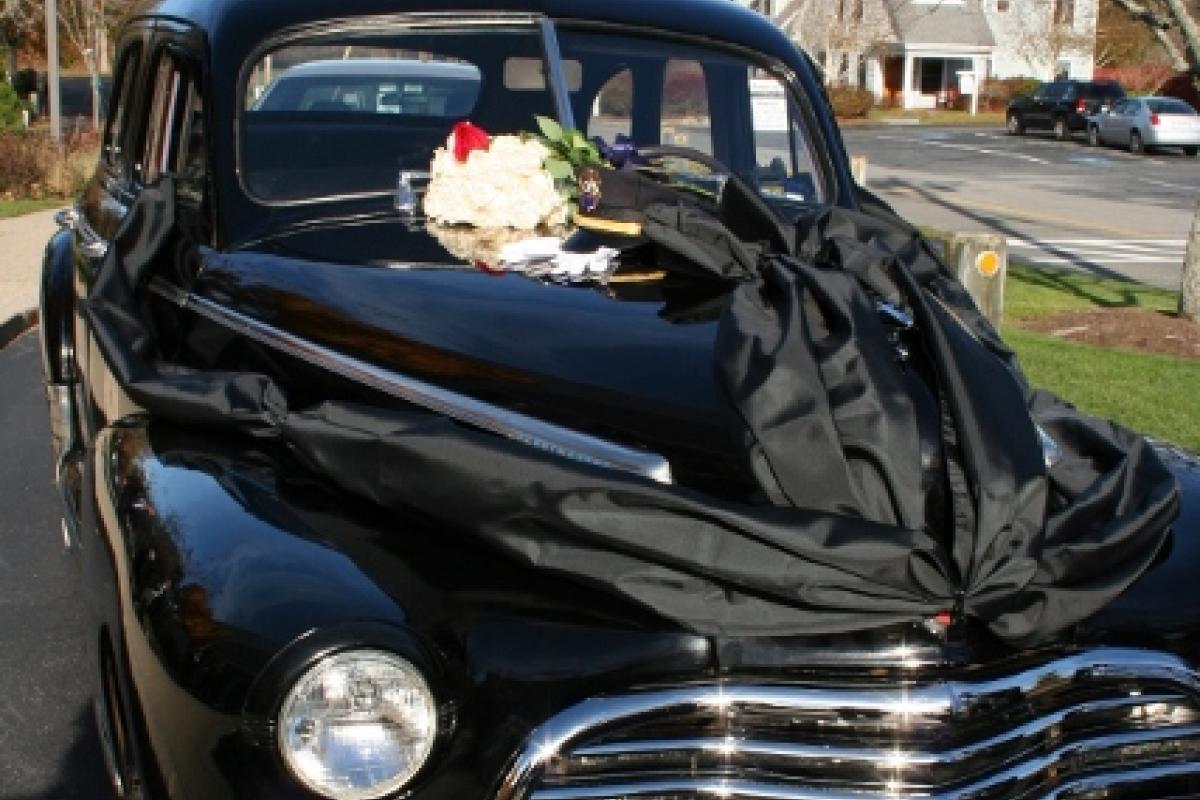 A police vehicle decorated with crape 4