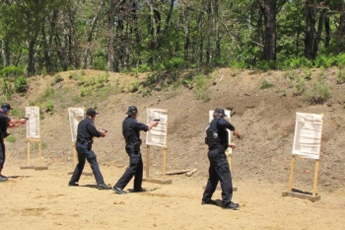 Police officers approaching targets
