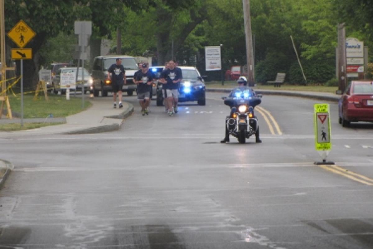 Officers running with police escort 8
