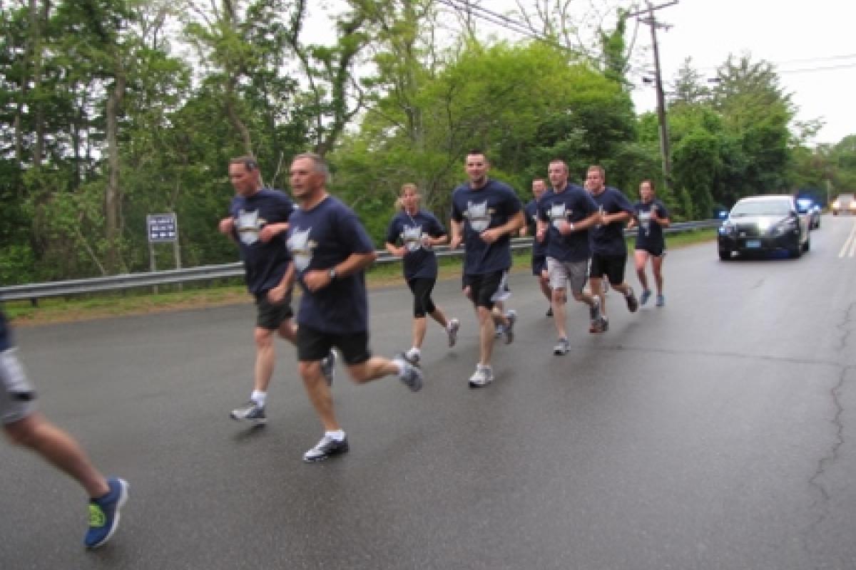 Officers running with police escort 6