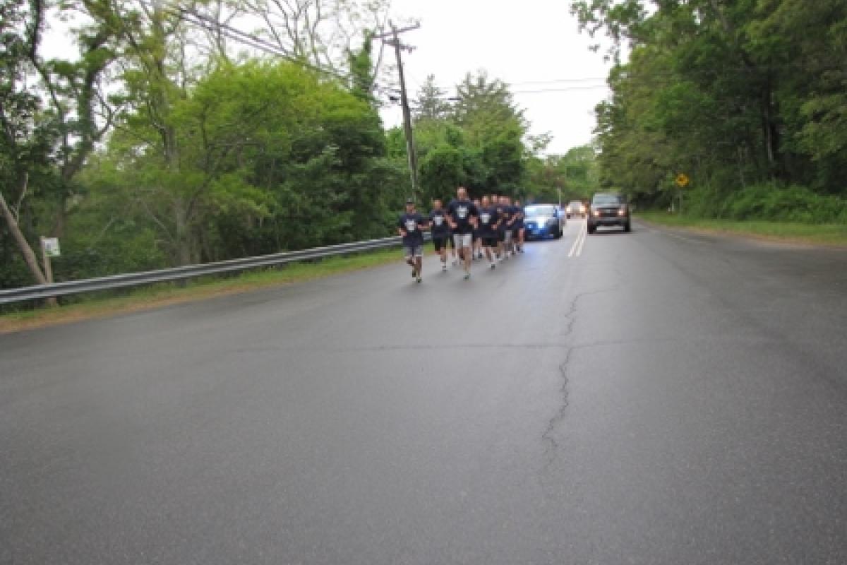 Officers running with police escort 5