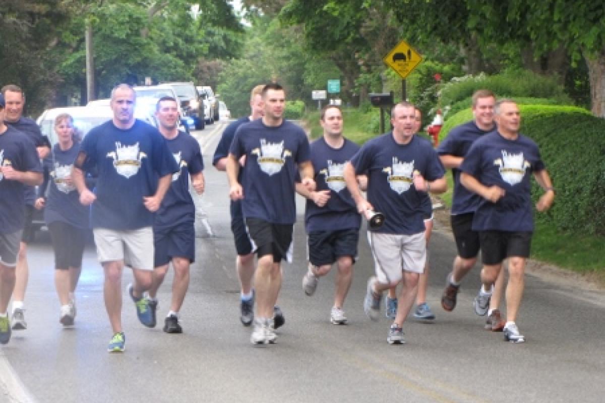 Officers running with police escort 4