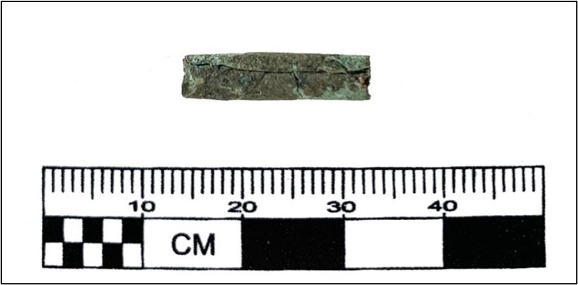 Rolled copper bead from site 19-BN-214 in Orleans